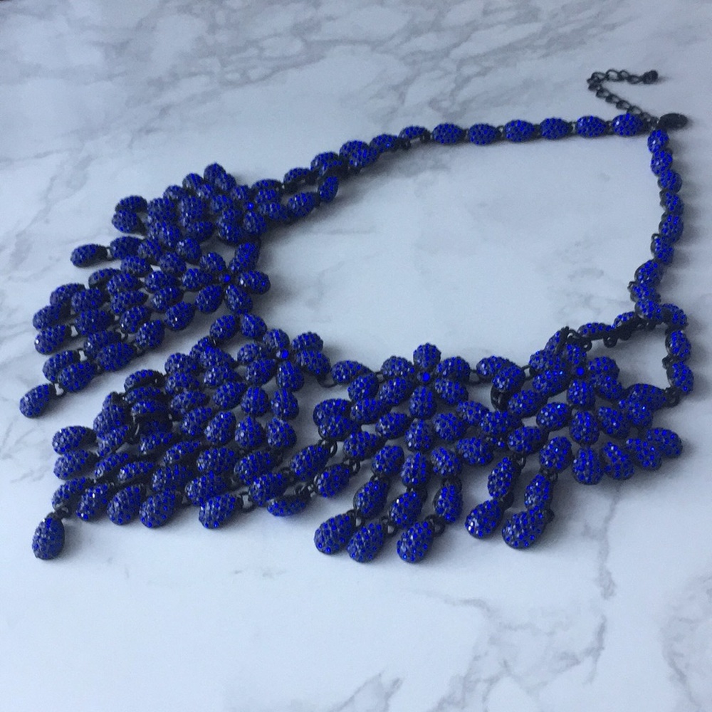 Blue necklace.